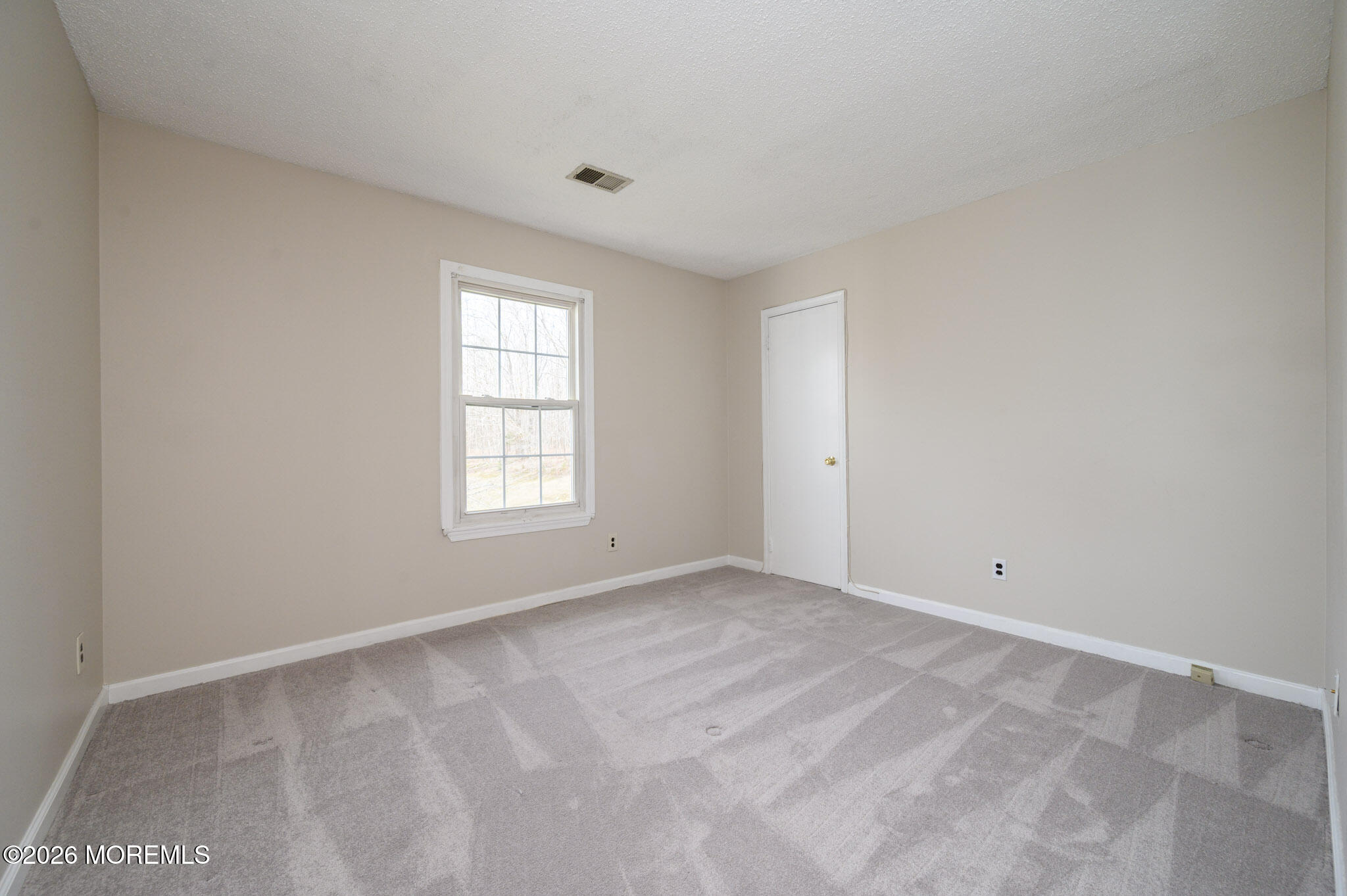 48 Frontier Way Tinton Falls, NJ 07753 - Photo 17 of 25 a view of an empty room with a window