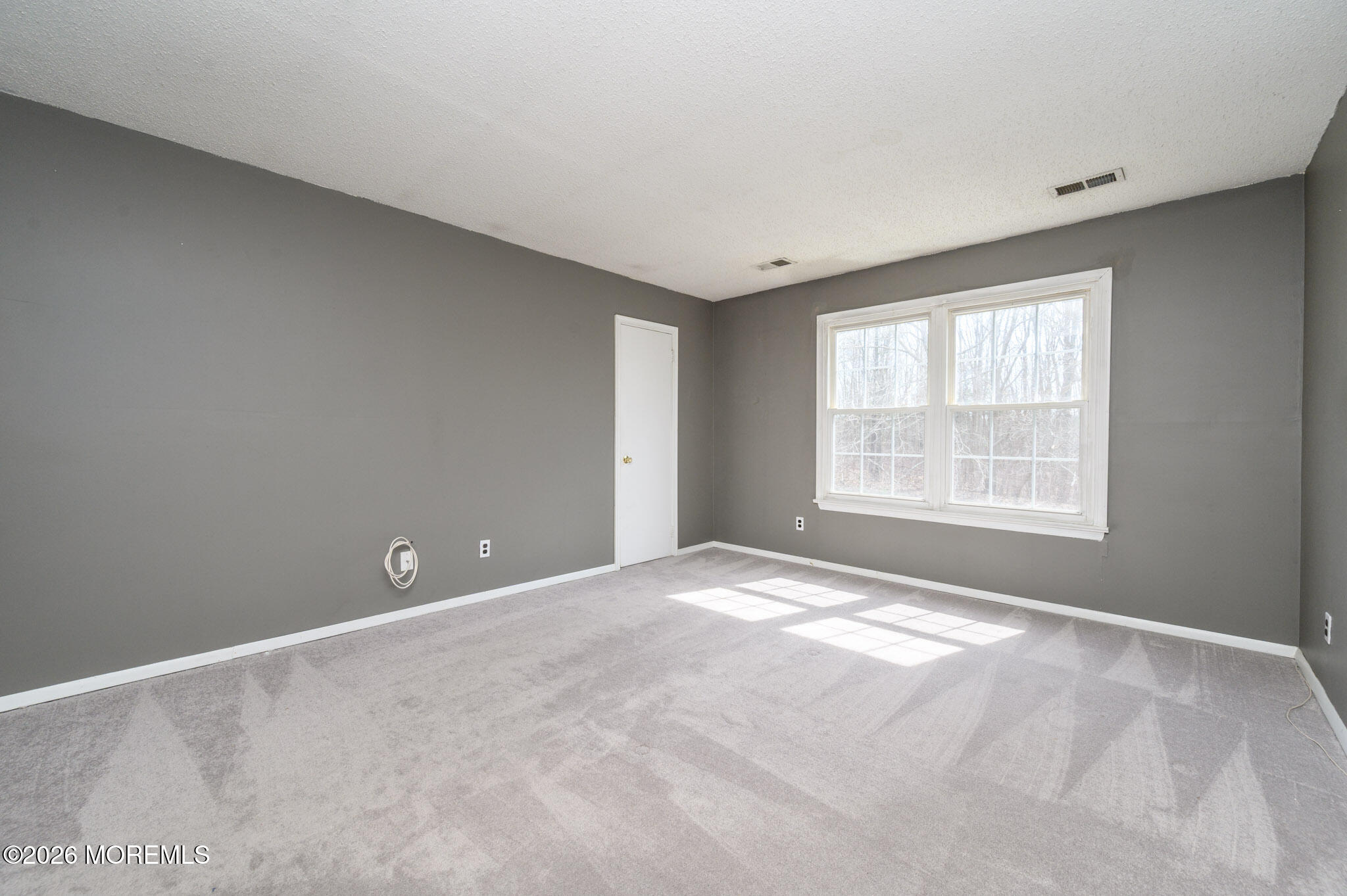 48 Frontier Way Tinton Falls, NJ 07753 - Photo 20 of 25 a view of an empty room with a window