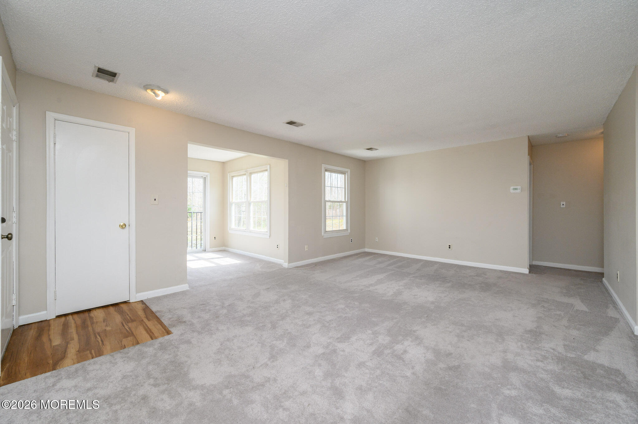 48 Frontier Way Tinton Falls, NJ 07753 - Photo 8 of 25 a view of an empty room with a window