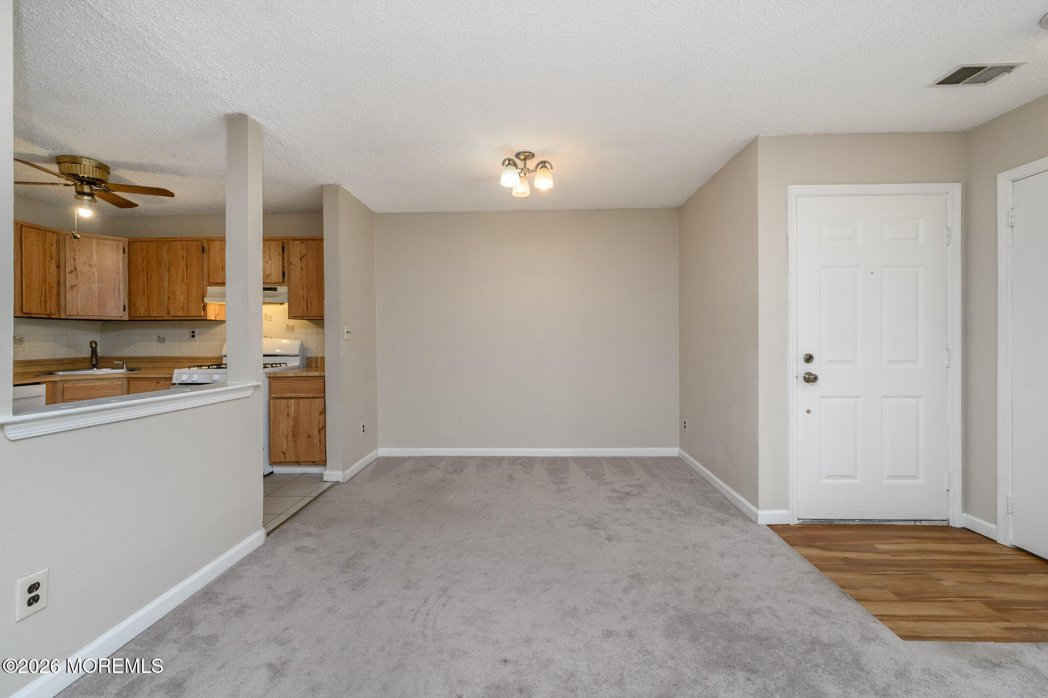 48 Frontier Way Tinton Falls, NJ 07753 - Photo 9 of 25 a view of kitchen with refrigerator sink and stove
