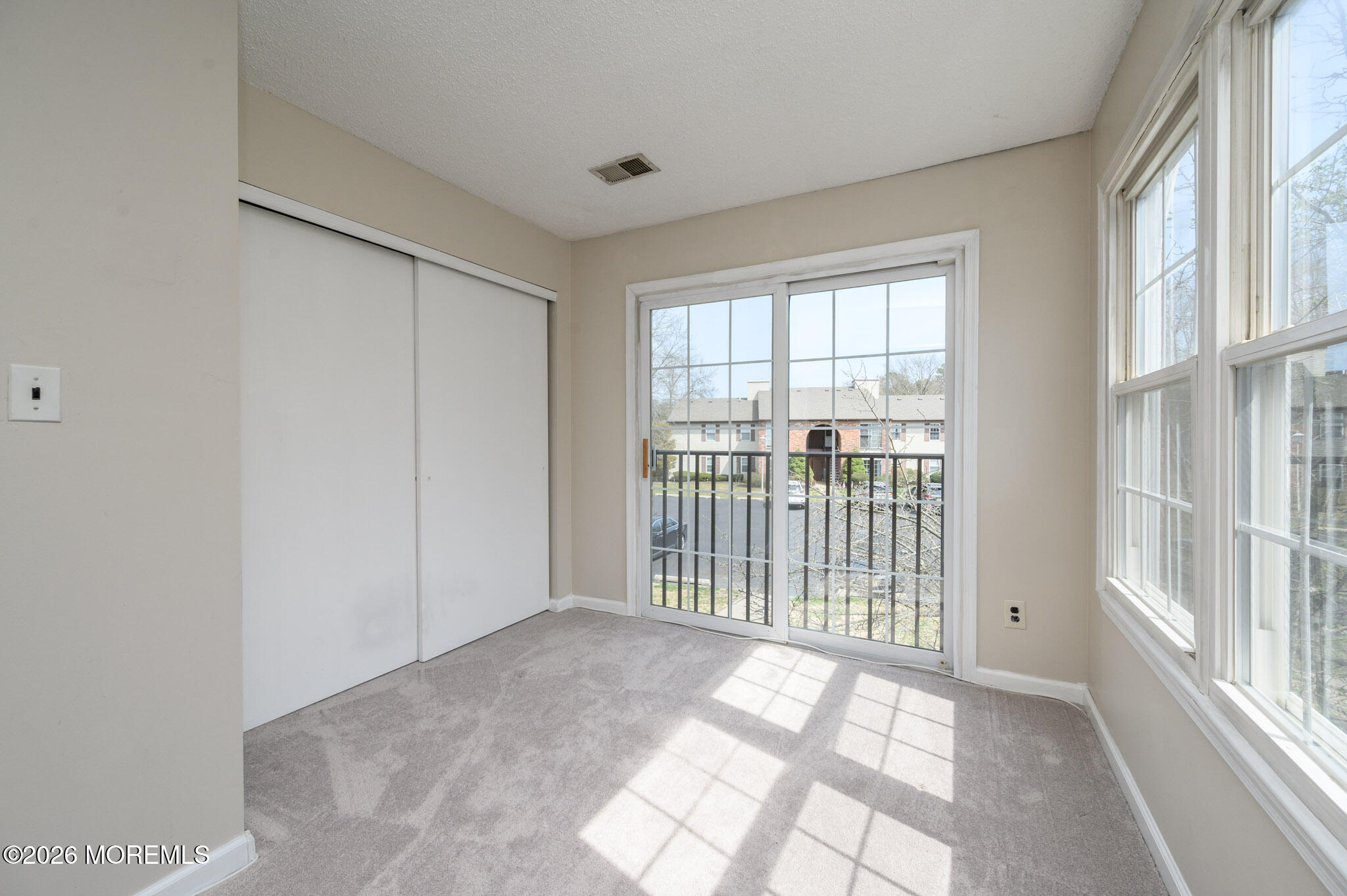 48 Frontier Way Tinton Falls, NJ 07753 - Photo 10 of 25 a view of a room with a large window