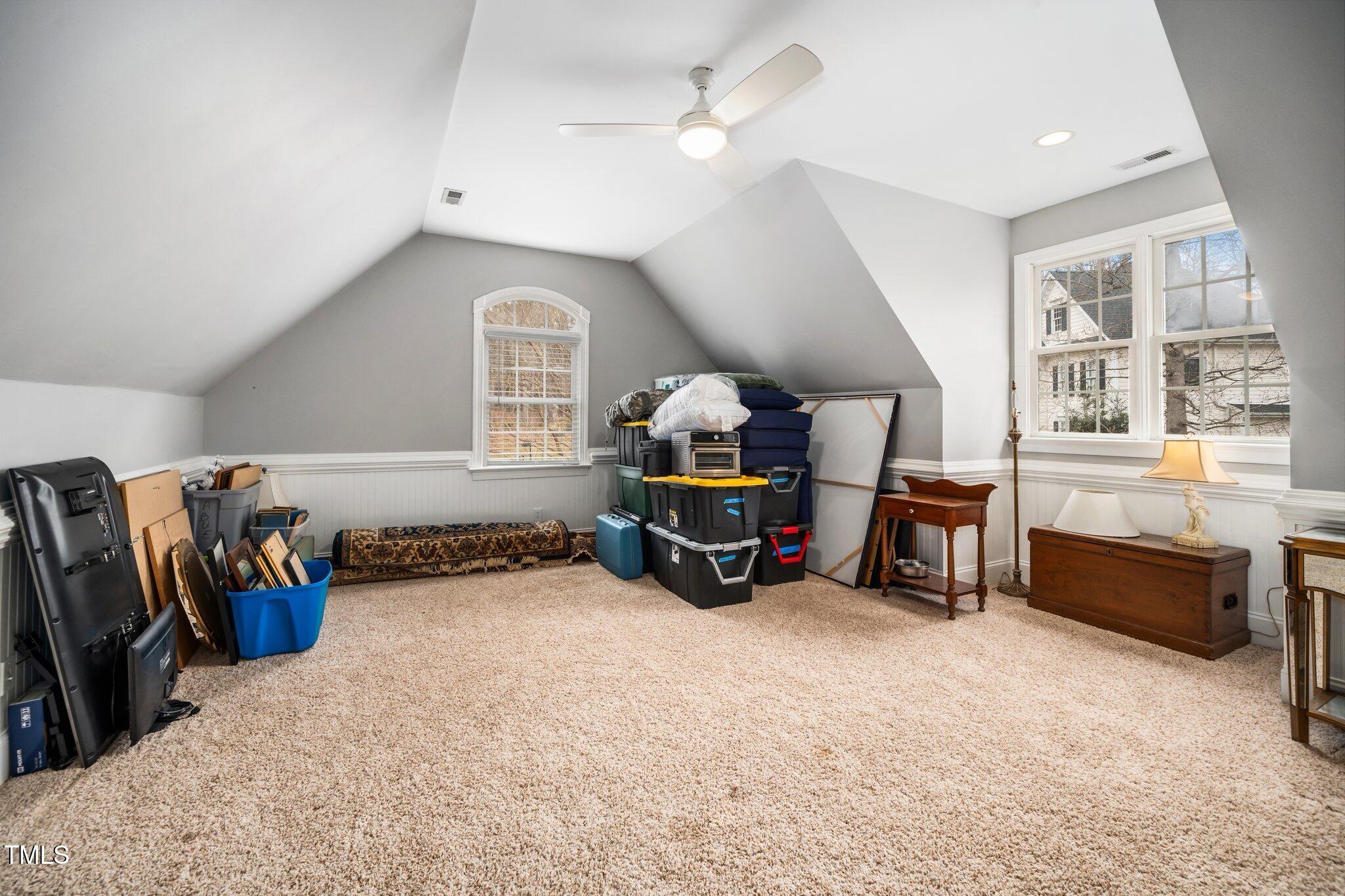 7001 Millstone Ridge Court Raleigh, NC 27614 - Photo 34 of 54 a room with furniture and a flat screen tv