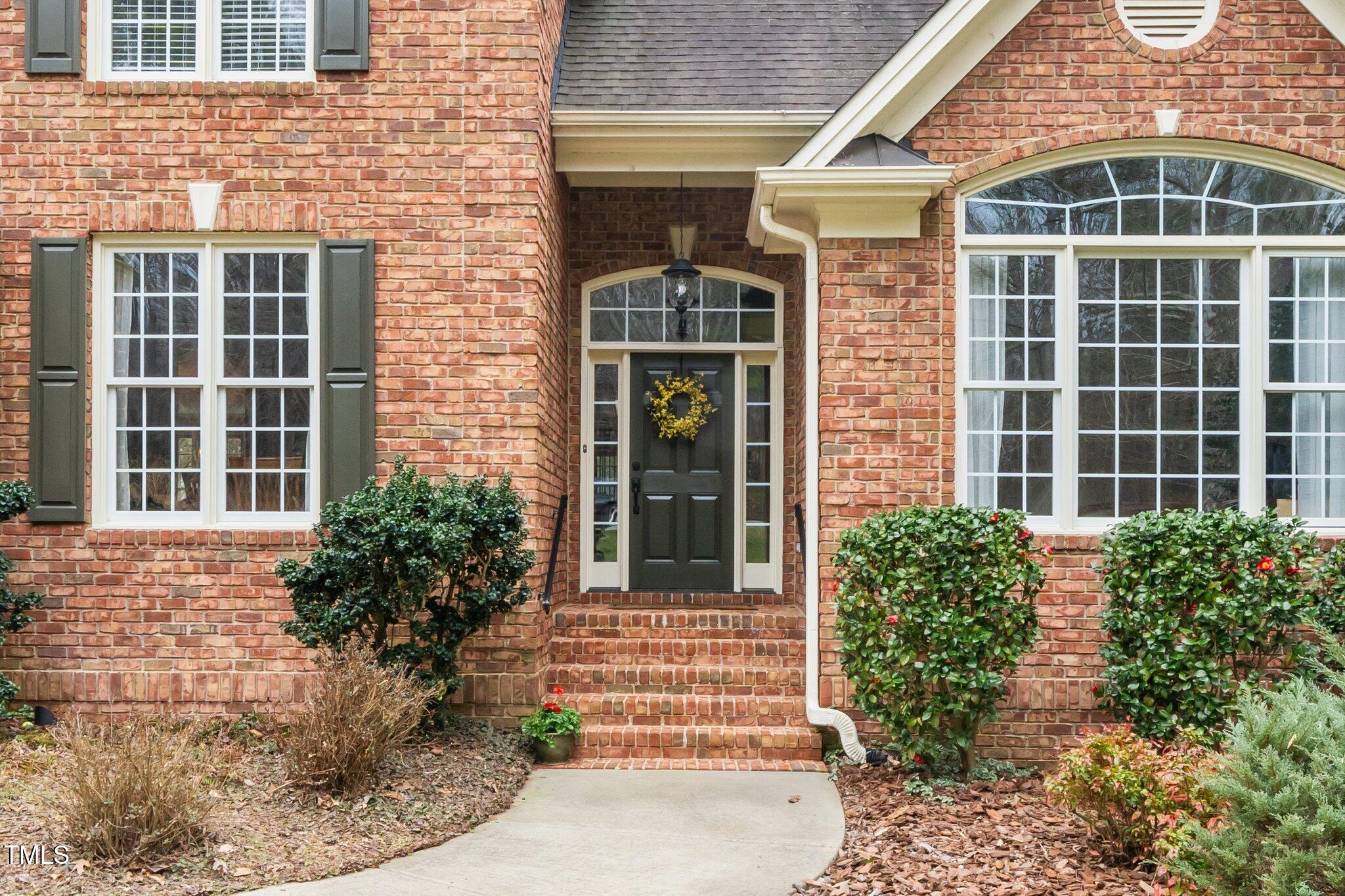 7001 Millstone Ridge Court Raleigh, NC 27614 - Photo 4 of 54 a front view of a house