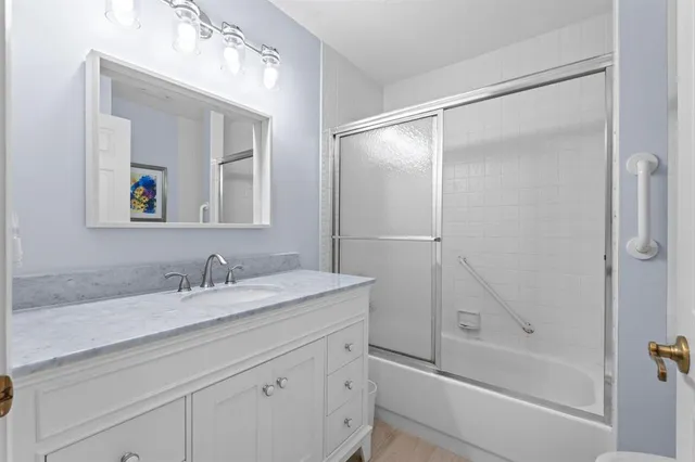 a workspace with furniture and ceiling fan