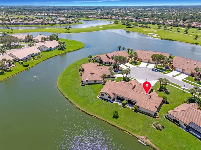 an aerial view of a residential houses with outdoor space swimming pool and outdoor space