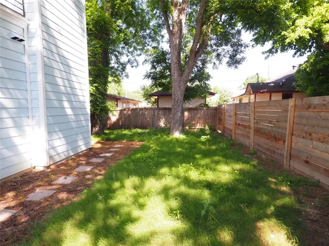 a view of yard with trees