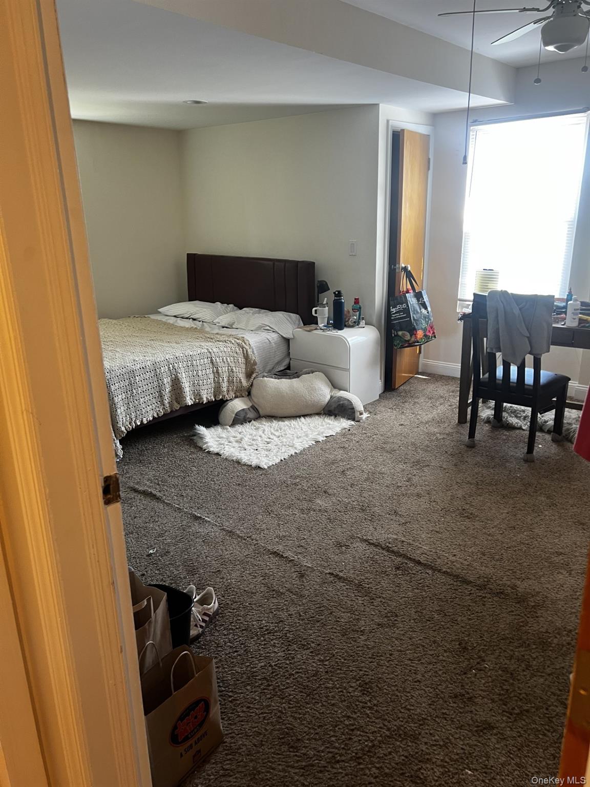 349 County Center Road, Unit TOP White Plains, NY 10603 - Photo 16 of 17 a bedroom with bed and window