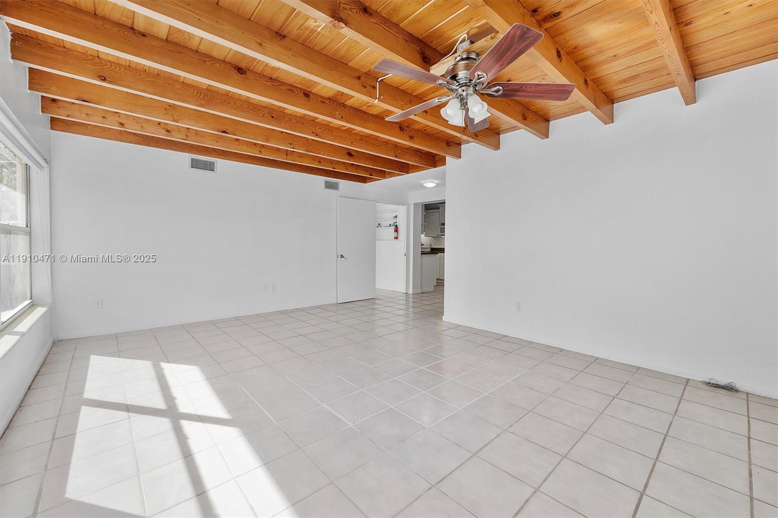 11111 Southwest 78th Court Pinecrest, FL 33156 - Photo 12 of 36 a view of a room with white walls