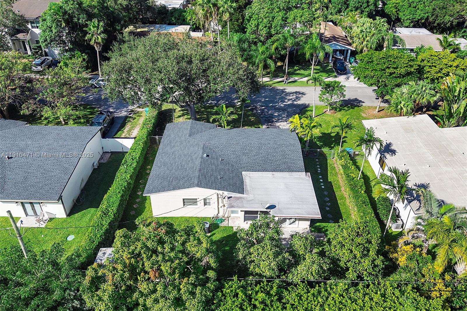 11111 Southwest 78th Court Pinecrest, FL 33156 - Photo 30 of 36 an aerial view of house with yard and swimming pool