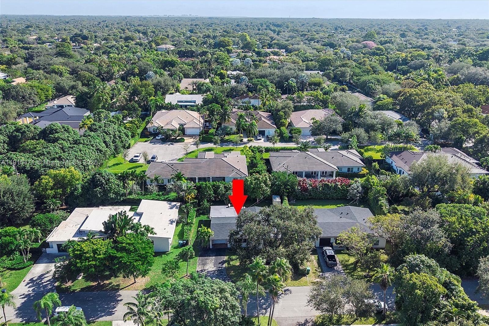 11111 Southwest 78th Court Pinecrest, FL 33156 - Photo 32 of 36 an aerial view of multiple house