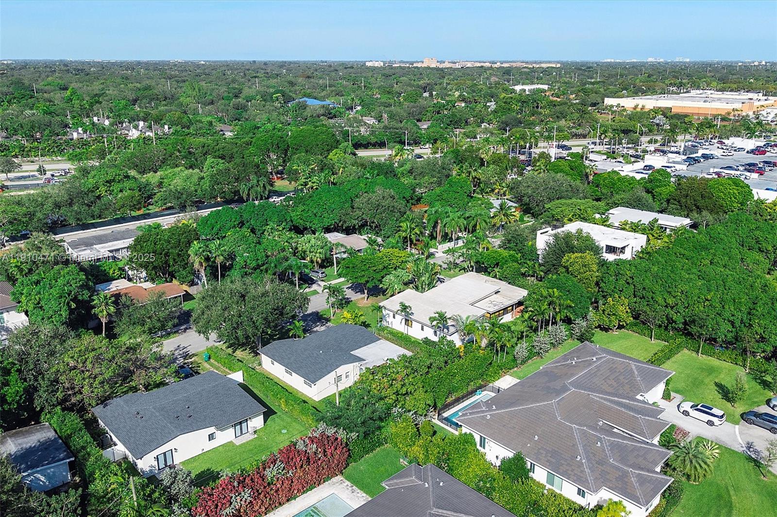 11111 Southwest 78th Court Pinecrest, FL 33156 - Photo 34 of 36 an aerial view of a house with a garden