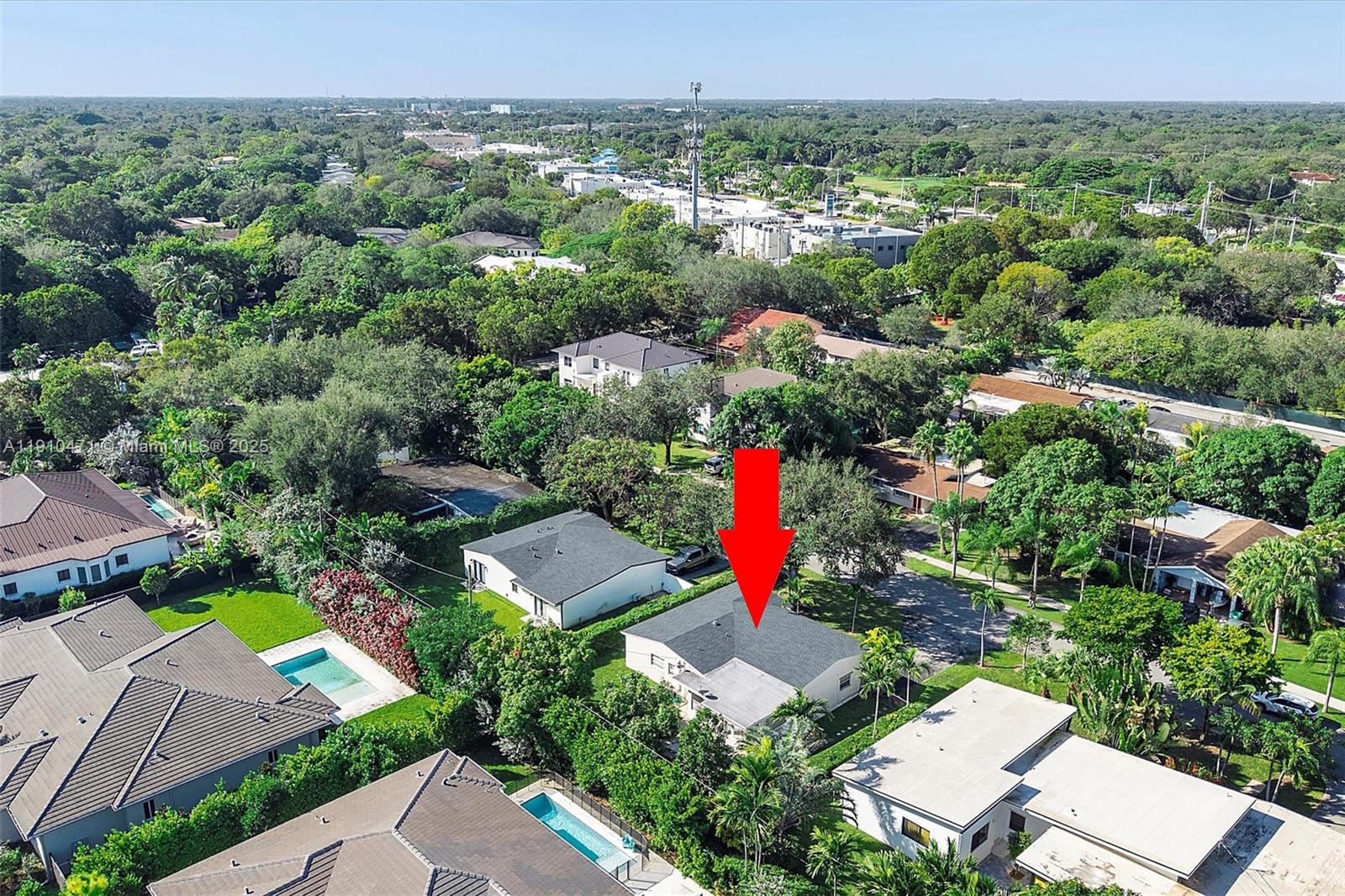 11111 Southwest 78th Court Pinecrest, FL 33156 - Photo 35 of 36 an aerial view of a house with swimming pool