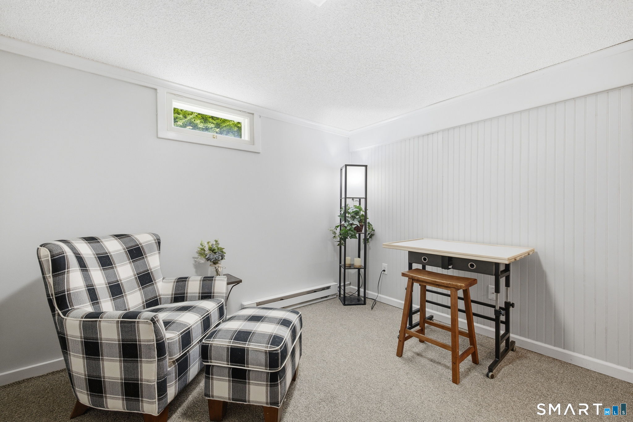 7 Stardust Drive Enfield, CT 06082 - Photo 25 of 38 a living room with furniture and painting on the wall