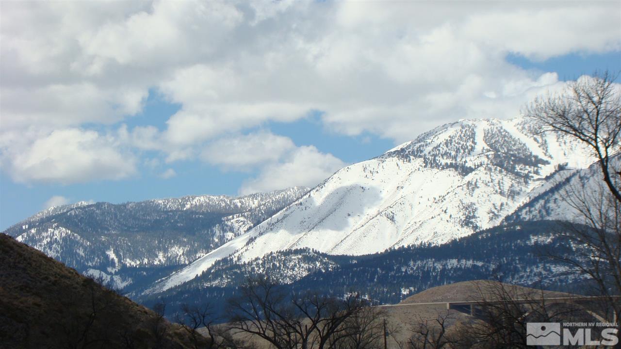 134 Andrew Lane, Unit 35 9 ACRES Reno, NV 89521 - Photo 2 of 28 a view of mountain with covered with snow