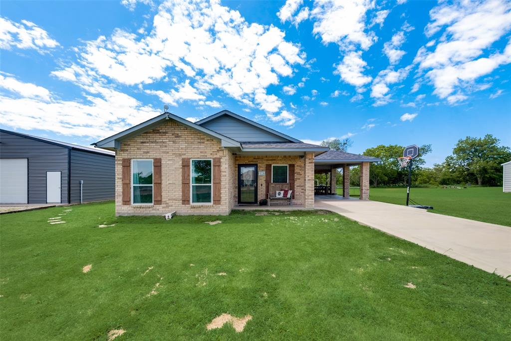 207 County Road 3433 Wills Point, TX 75169 - Photo 1 of 1 a view of a house with a yard