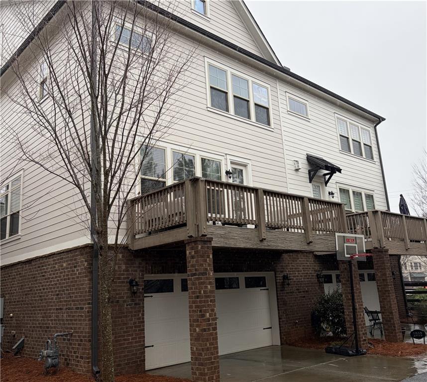 1007 Edgemont Drive, Unit 17 Alpharetta, GA 30009 - Photo 22 of 22 a view of a house with a balcony