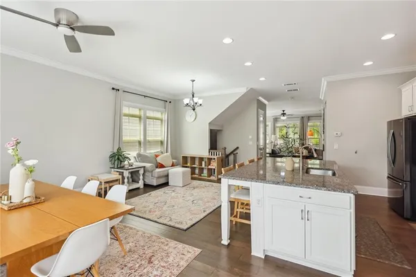a living room with furniture or window and wooden floor