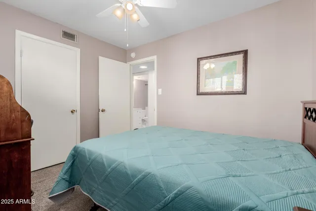 a bathroom with a toilet and a sink