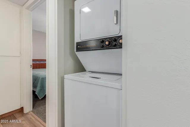 a patio with table and chairs