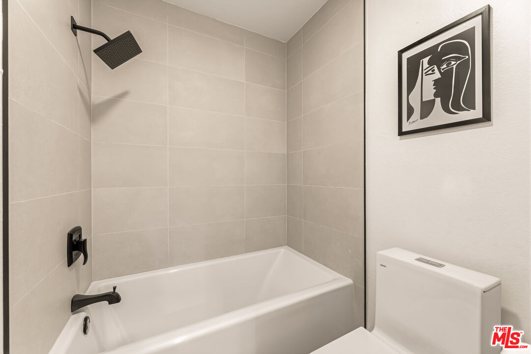 311 Bora Bora Way, Unit 3207 Marina del Rey, CA 90292 - Photo 35 of 54 a bathroom with a bathtub and a toilet