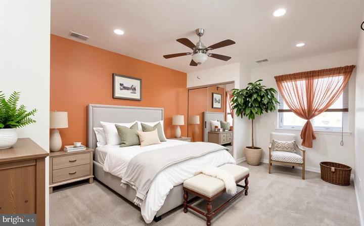 550 Riviera Drive, Unit 550B Joppa, MD 21085 - Photo 6 of 11 a bedroom with bed and a large window
