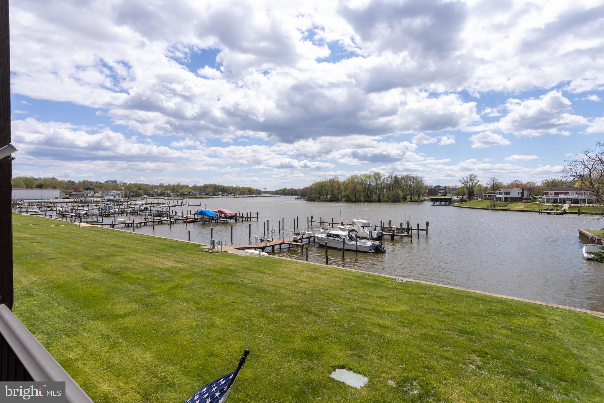 550 Riviera Drive, Unit 550B Joppa, MD 21085 - Photo 10 of 11 a view of a lake with outdoor space