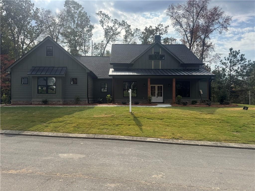 a front view of a house with a yard