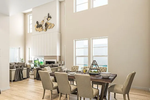 a view of a dining room with furniture window and outside view