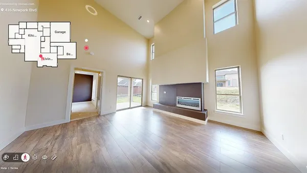 a view of a livingroom with wooden floor