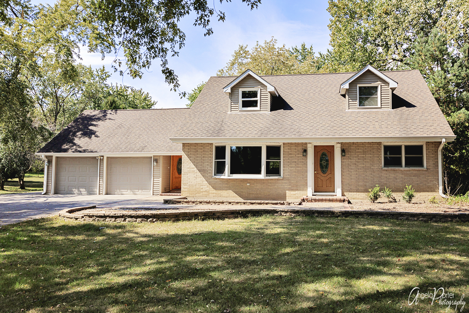 39240 North Winchester Road Wadsworth, IL 60083 - Photo 1 of 28 a front view of a house with swimming pool and yard