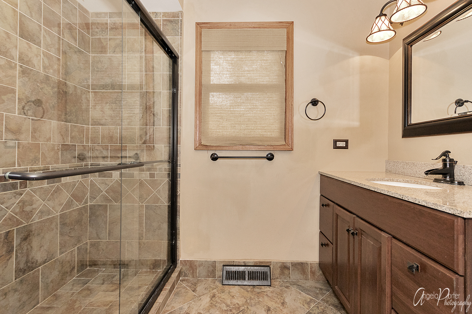 39240 North Winchester Road Wadsworth, IL 60083 - Photo 12 of 28 a bathroom with a granite countertop sink a mirror and shower