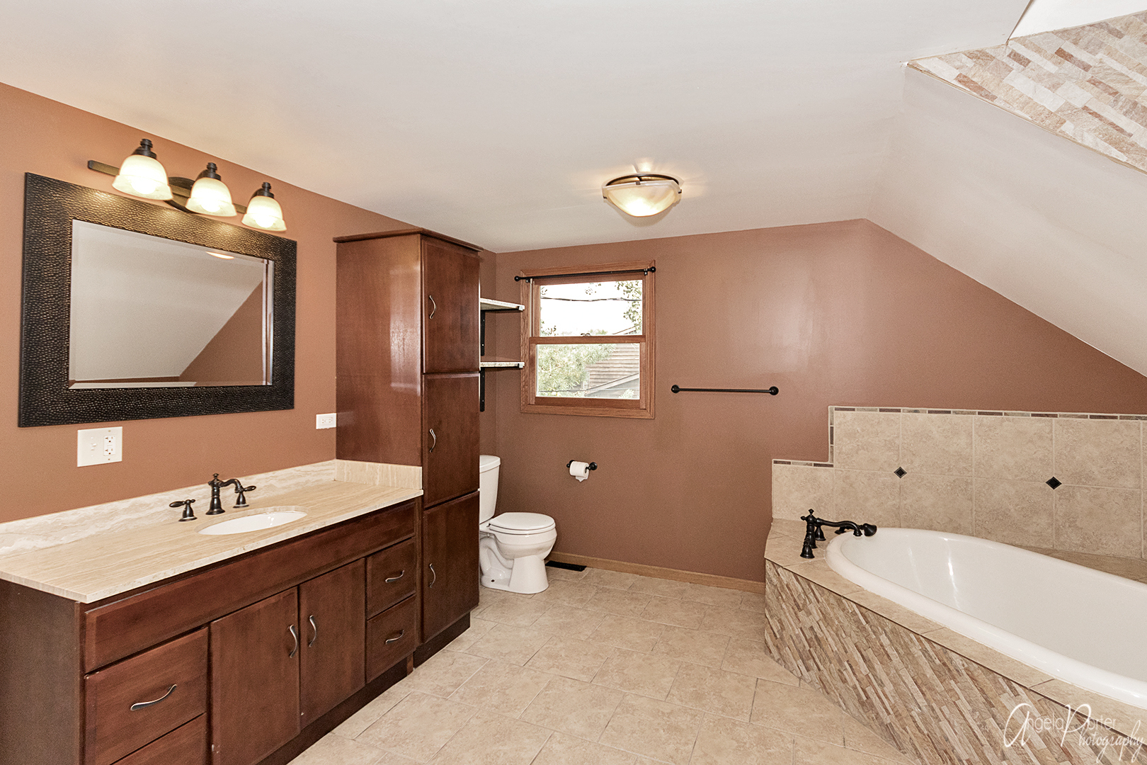 39240 North Winchester Road Wadsworth, IL 60083 - Photo 16 of 28 a bathroom with a double vanity sink mirror and bathtub