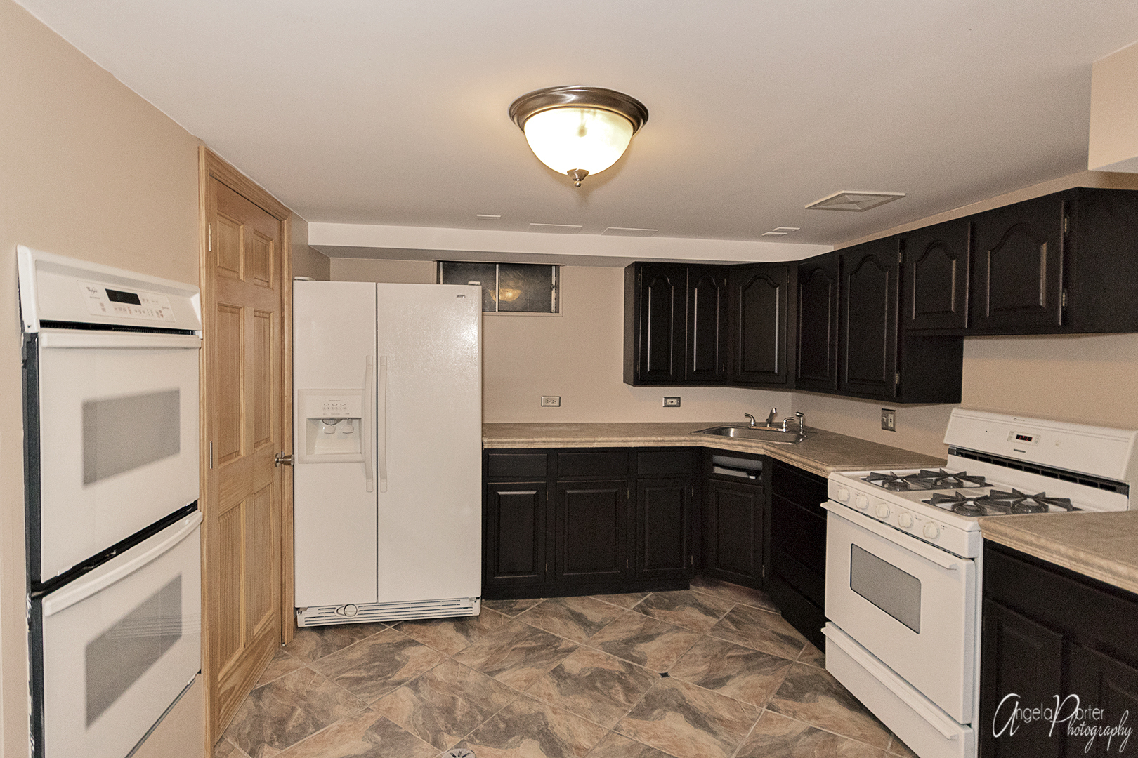 39240 North Winchester Road Wadsworth, IL 60083 - Photo 21 of 28 a kitchen with stainless steel appliances granite countertop a refrigerator and a stove top oven