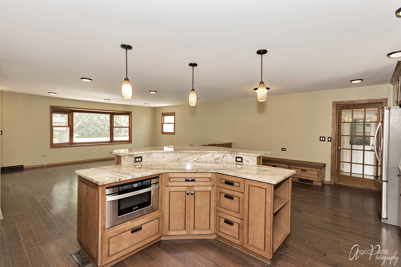 39240 North Winchester Road Wadsworth, IL 60083 - Photo 6 of 28 a kitchen that has a stove and a wooden floor