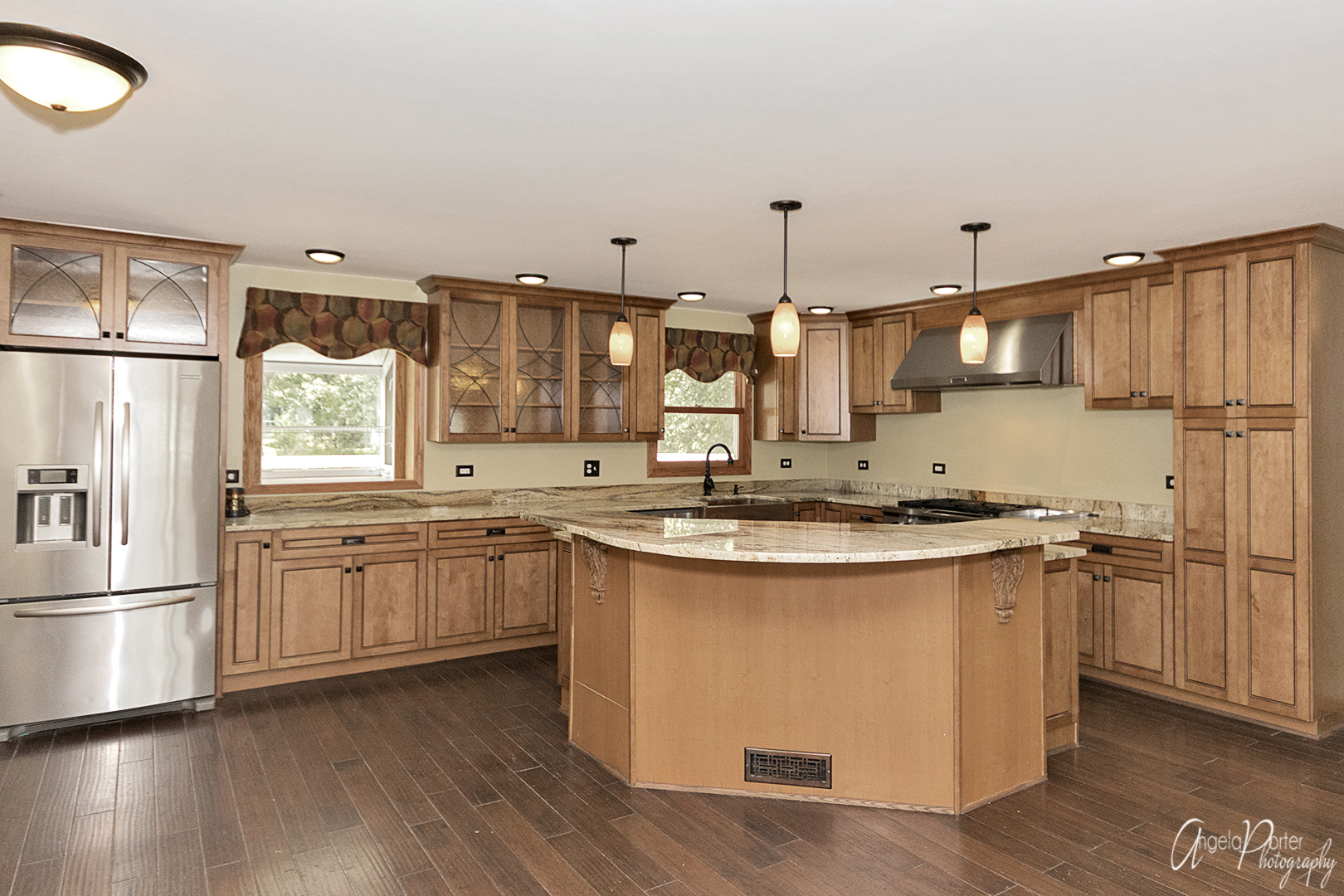 39240 North Winchester Road Wadsworth, IL 60083 - Photo 8 of 28 a kitchen with stainless steel appliances granite countertop a sink a stove a refrigerator and island with wooden floor