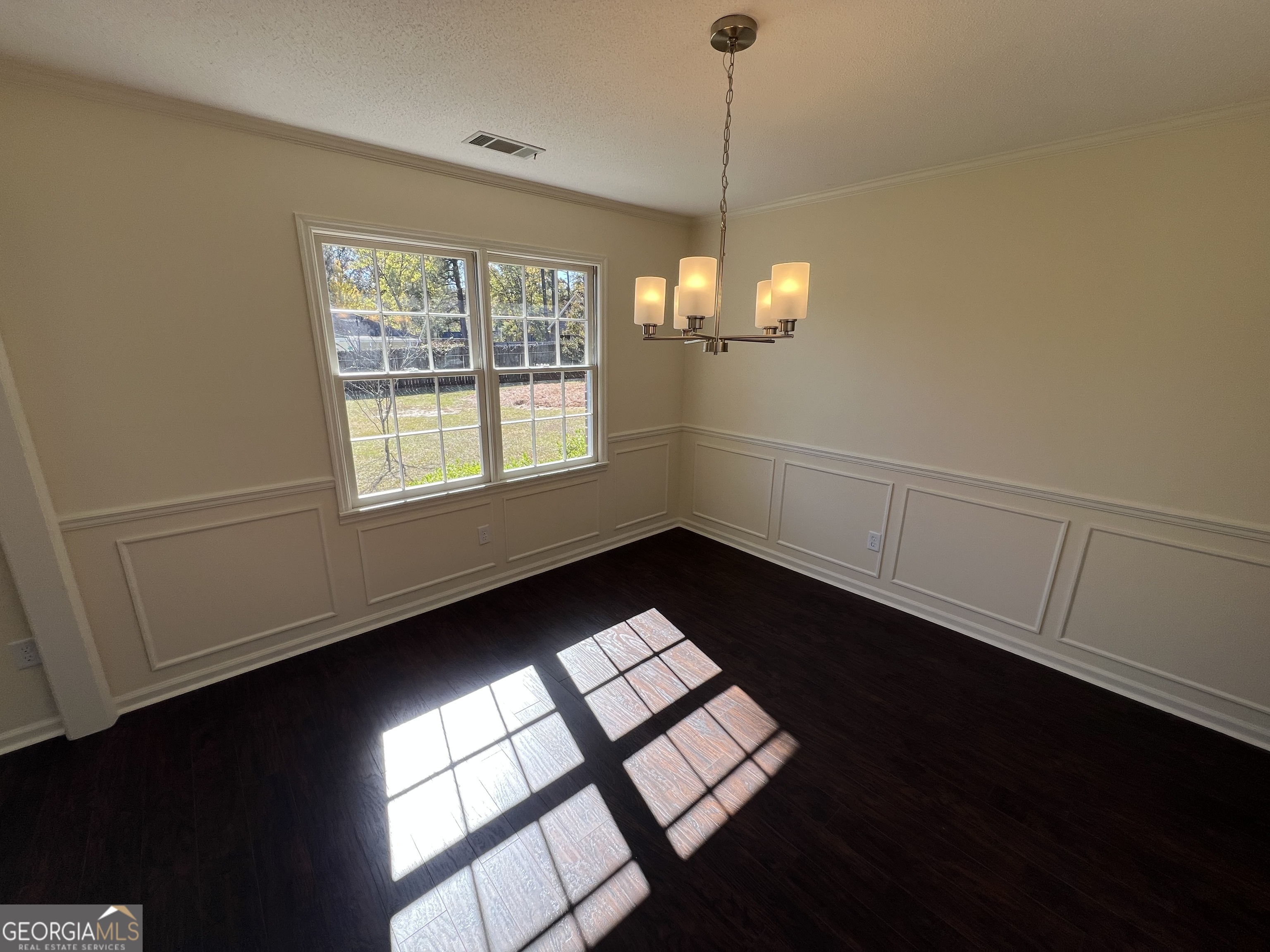 311 Fairmont Road Dublin, GA 31021 - Photo 11 of 33 a view of an empty room with a window