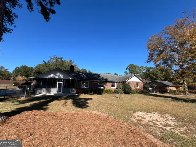 a view of a town with cars