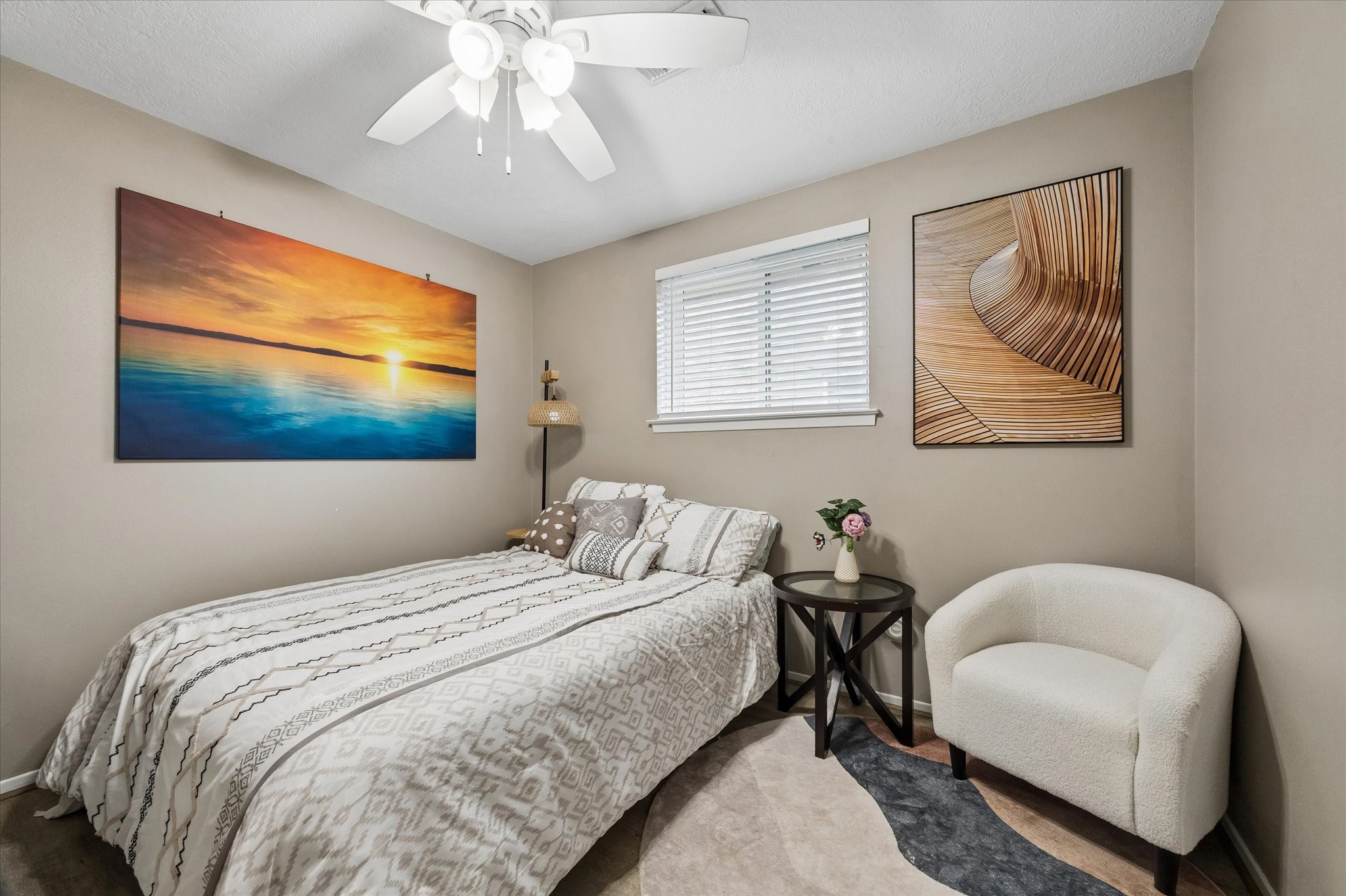 1931 Westlake Road Houston, TX 77062 - Photo 24 of 28 Another inviting bedroom offers a comfortable retreat with a large closet and convenient access to the nearby full bath, giving family or overnight guests a stylish space of their own.