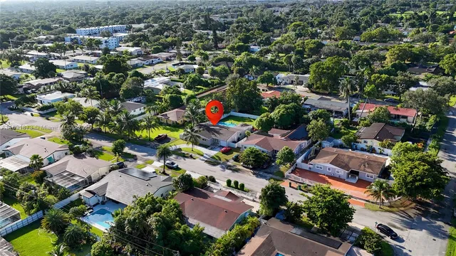 an aerial view of a city with lots of residential buildings