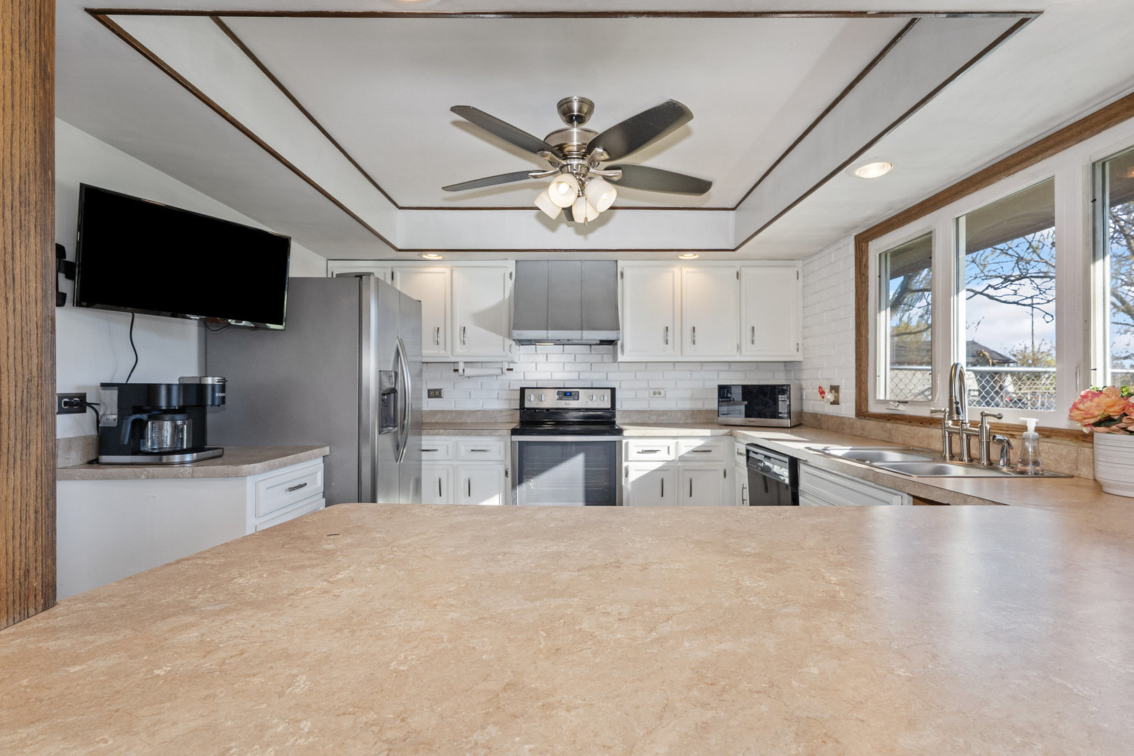 3541 East Danne Road Crete, IL 60417 - Photo 18 of 41 a kitchen with stainless steel appliances granite countertop a sink refrigerator stove and microwave