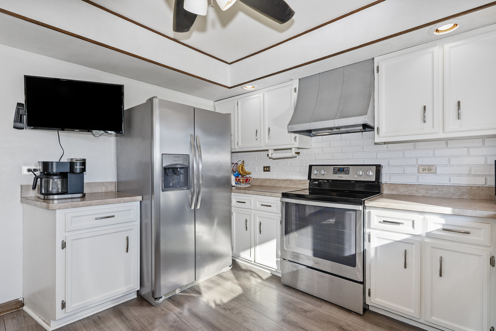 3541 East Danne Road Crete, IL 60417 - Photo 19 of 41 a kitchen with stainless steel appliances a stove microwave and cabinets