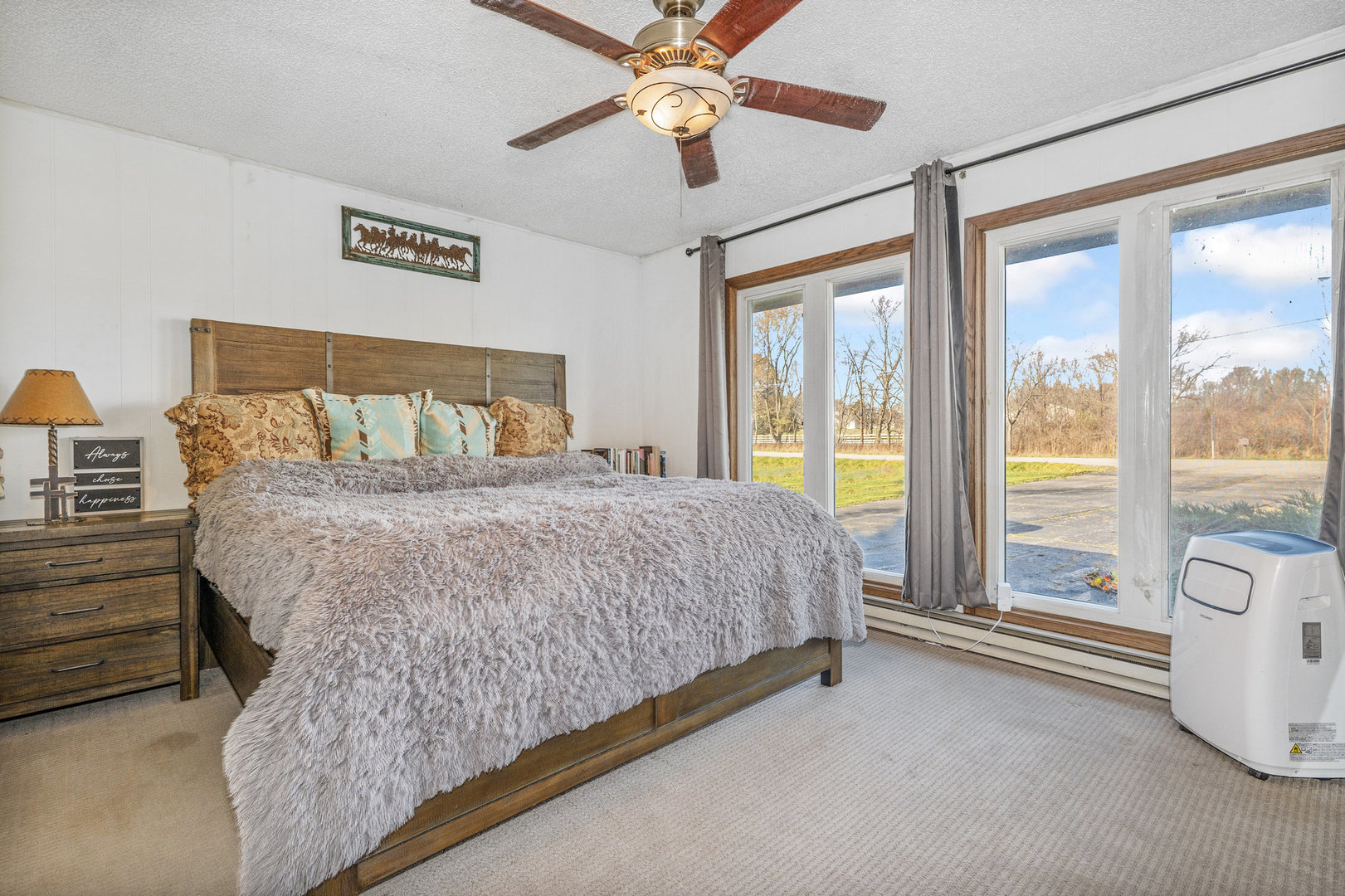 3541 East Danne Road Crete, IL 60417 - Photo 25 of 41 a bed sitting in a bedroom next to a window