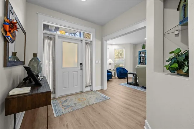 a view of a livingroom with furniture and windows