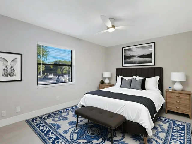 an aerial view of residential house with an outdoor space and garden