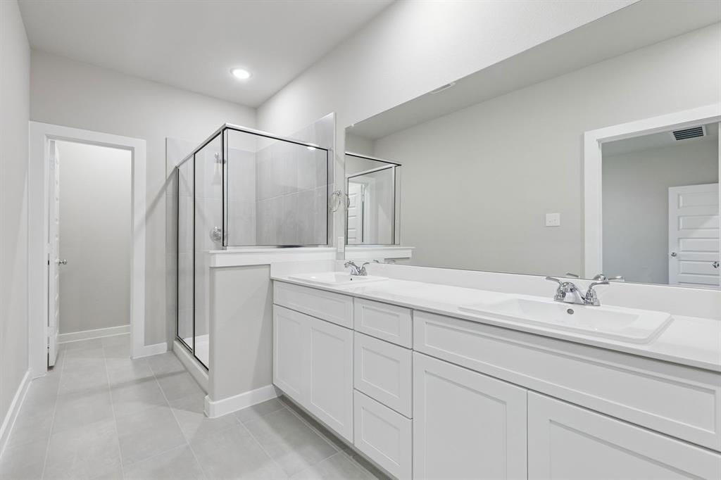 9648 Rango Road Fort Worth, TX 76123 - Photo 26 of 39 Primary Bathroom in the Holden home plan by Trophy Signature Homes – REPRESENTATIVE PHOTO
