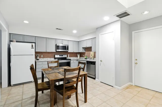 a view of a dining room with furniture