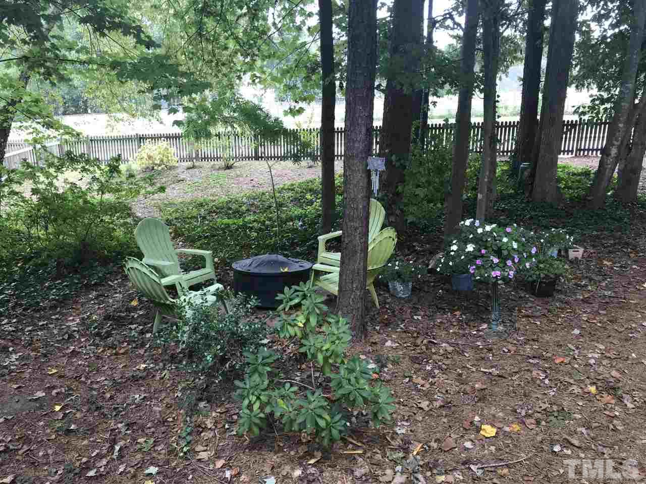 4740 Worcester Place Raleigh, NC 27604 - Photo 24 of 25 a garden view with a seating space