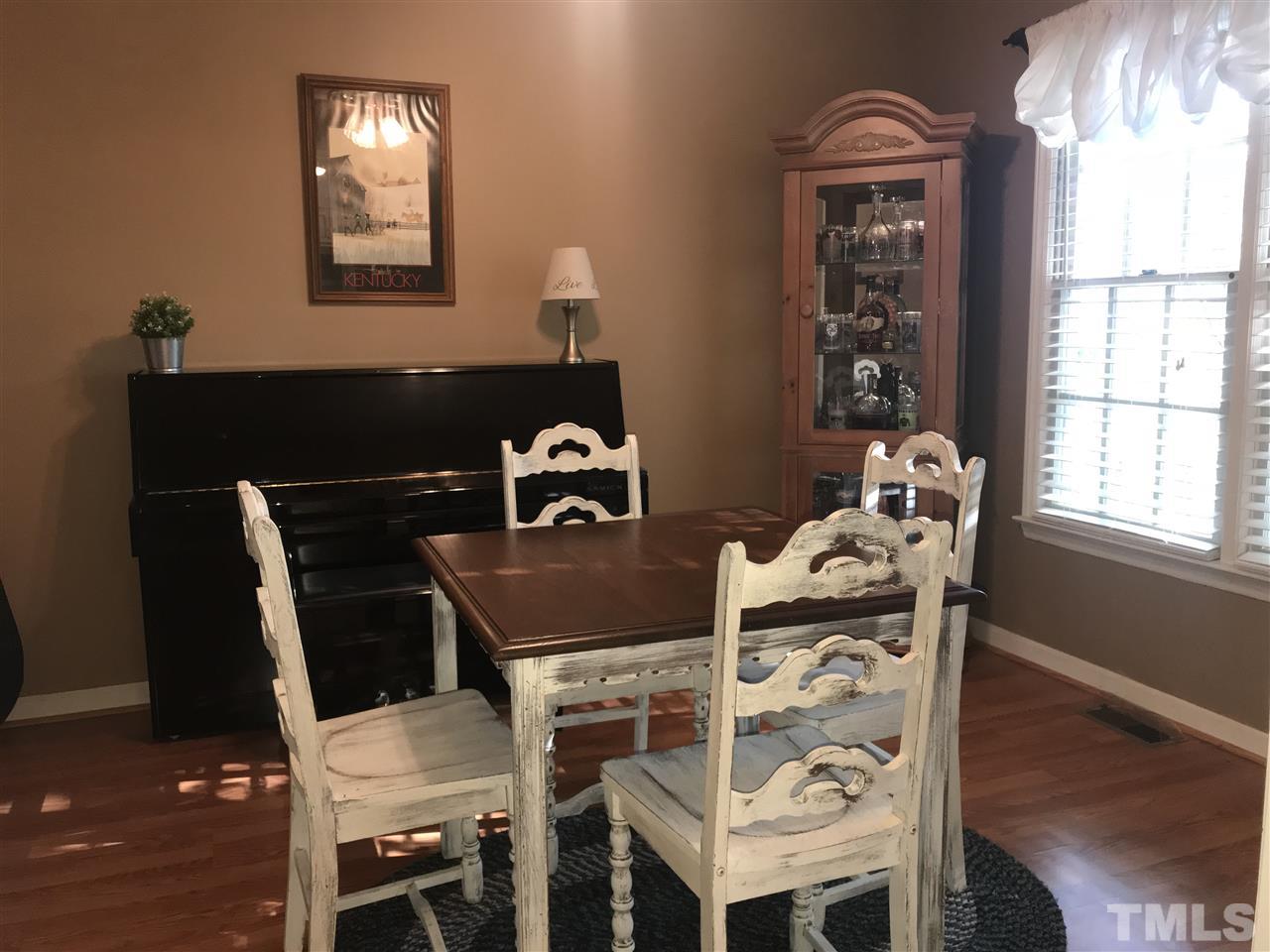 4740 Worcester Place Raleigh, NC 27604 - Photo 6 of 25 a dining room with furniture and window