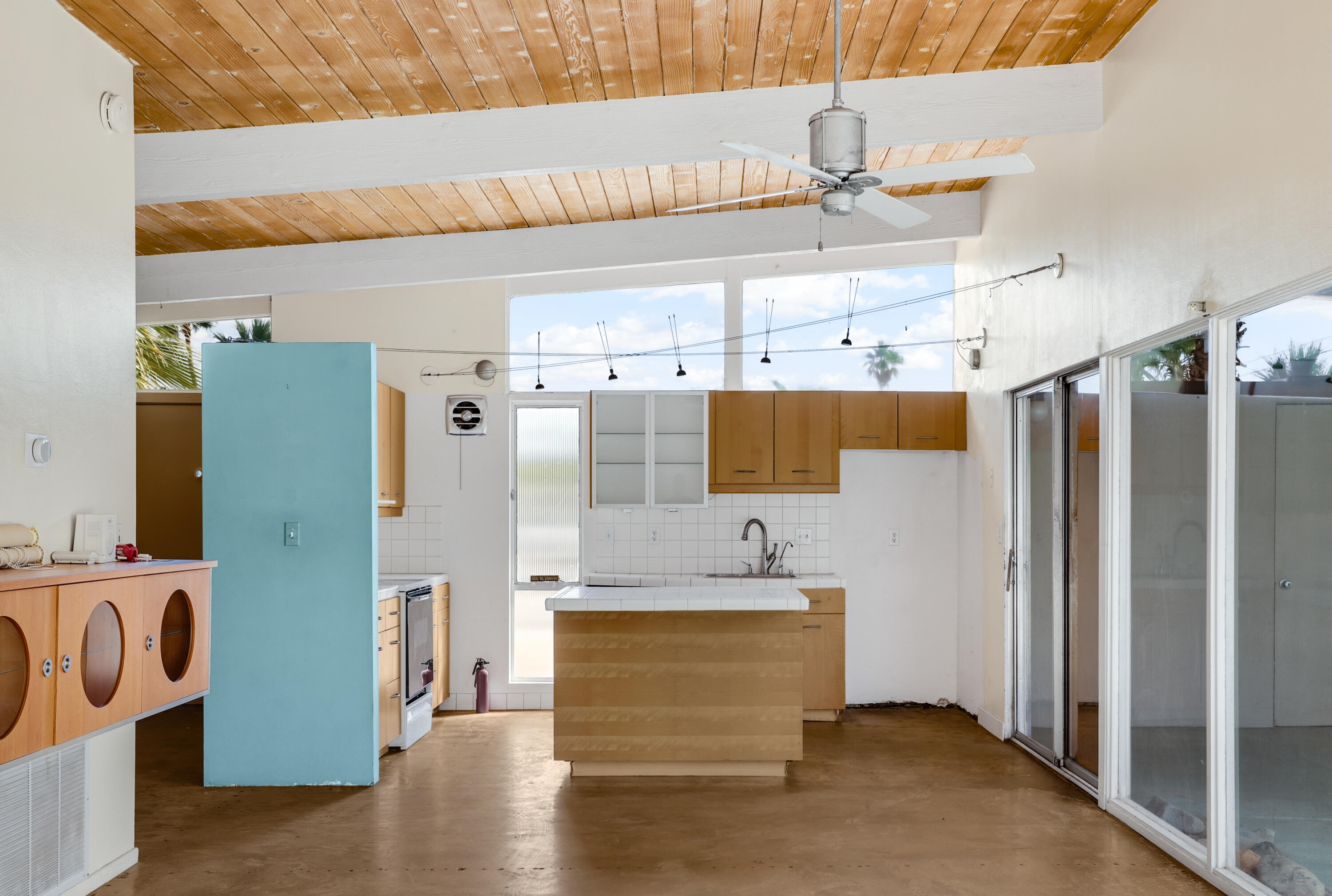 2839 North Davis Way Palm Springs, CA 92262 - Photo 11 of 29 a view of a refrigerator a window and kitchen view