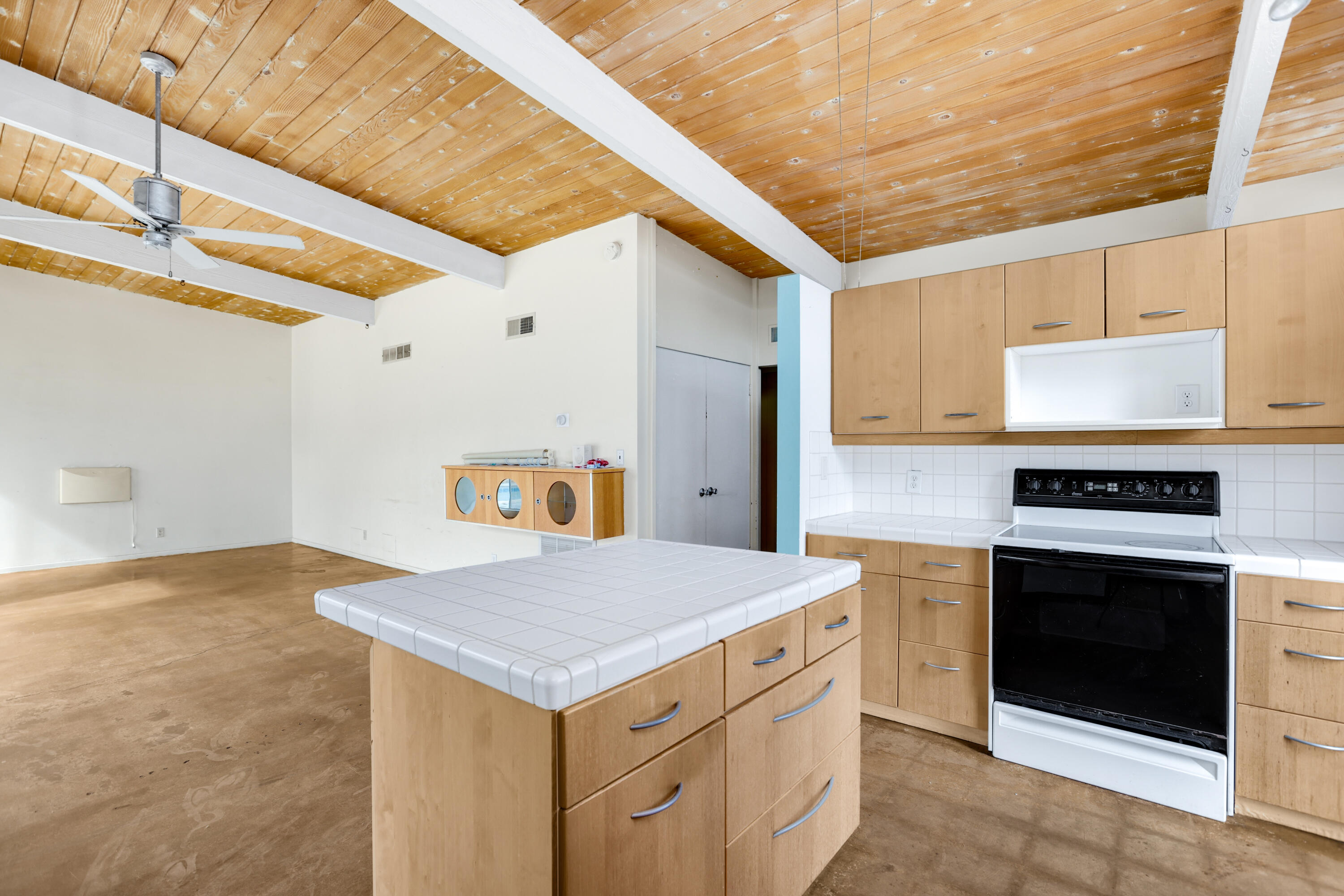 2839 North Davis Way Palm Springs, CA 92262 - Photo 12 of 29 a kitchen with a stove a sink and a refrigerator